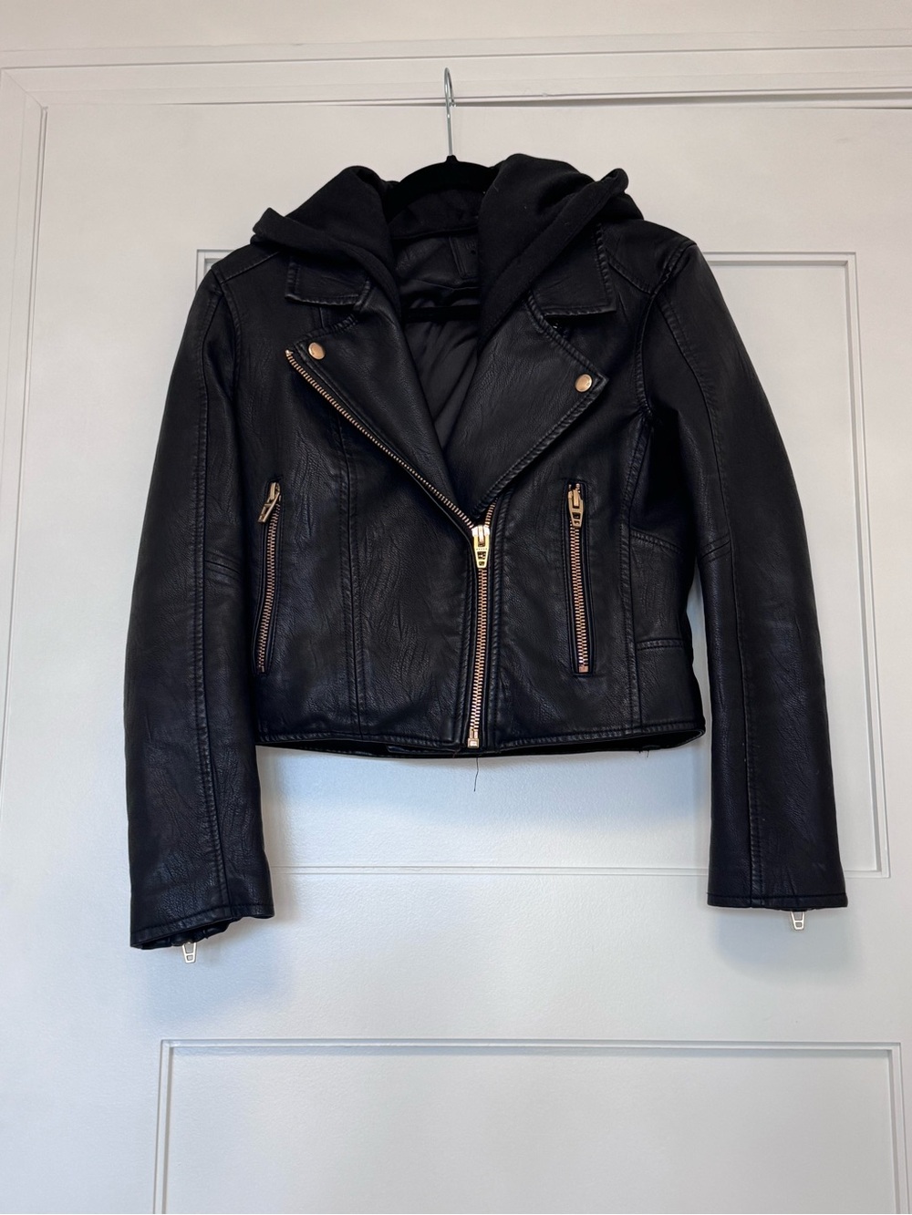 BLANK NYC Woman’s Black Faux Leather Moto Jacket with Hoodie